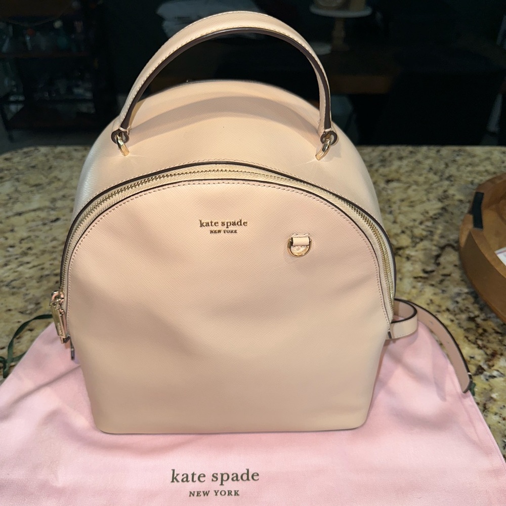 Kate Spade Backpack. Like new. Dust bag included.